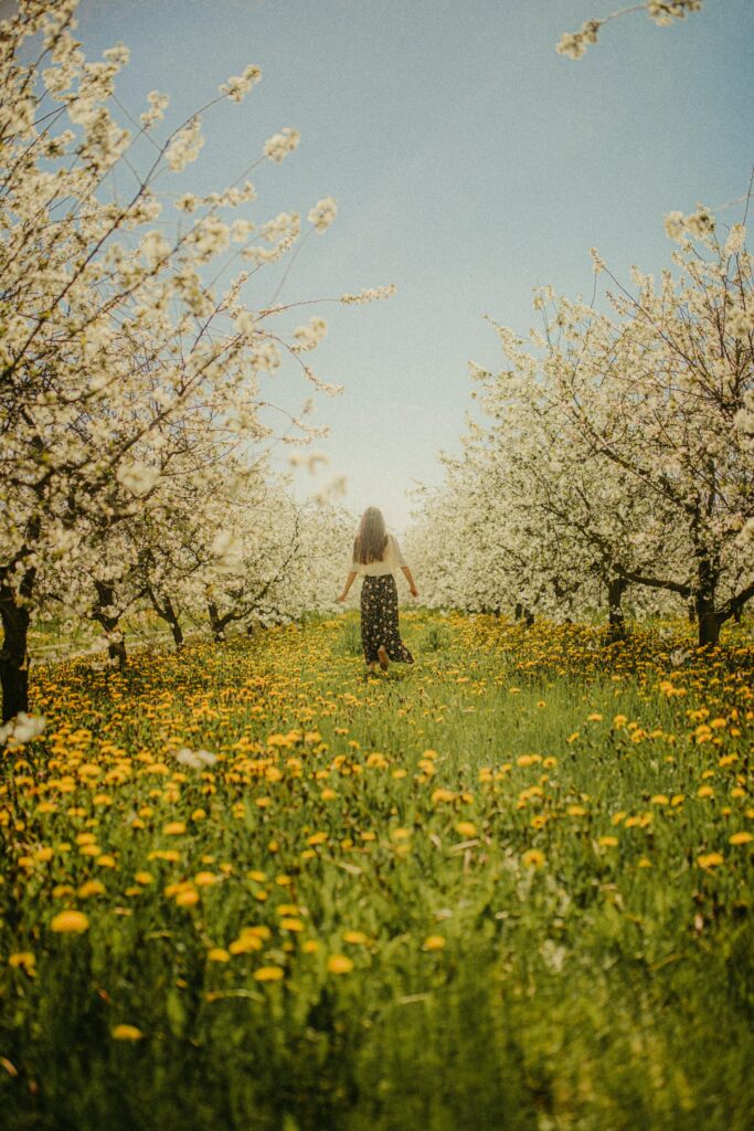 Woman walking enjoying the spiritual significance of springtime